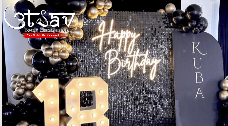 Luxury birthday party decoration with balloon décor, illuminated number display, and elegant backdrop by professional party planners