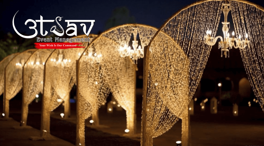 Luxury party entry decoration with crystal curtain lights, chandeliers, and illuminated entrance by professional party planners