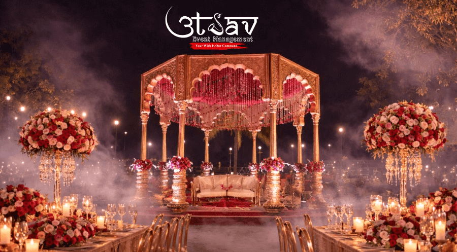 Royal wedding mandap decoration with palace-style pillars, floral arrangements, candle lighting, and luxury seating by professional wedding planners
