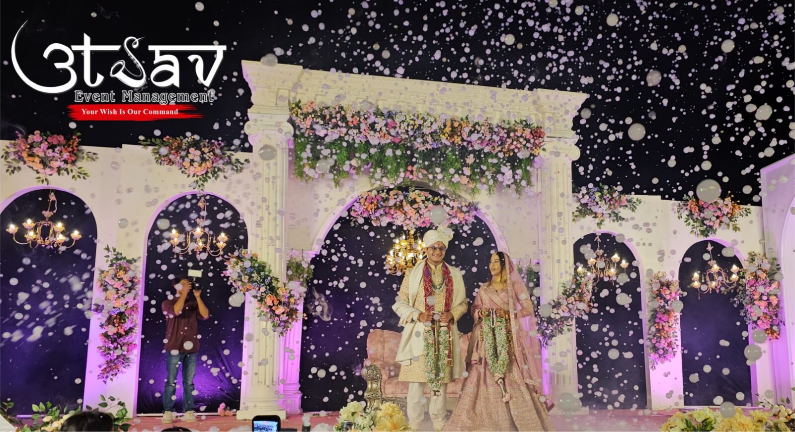 Luxury varmala stage with floral decoration elegant lighting and premium wedding event management in India